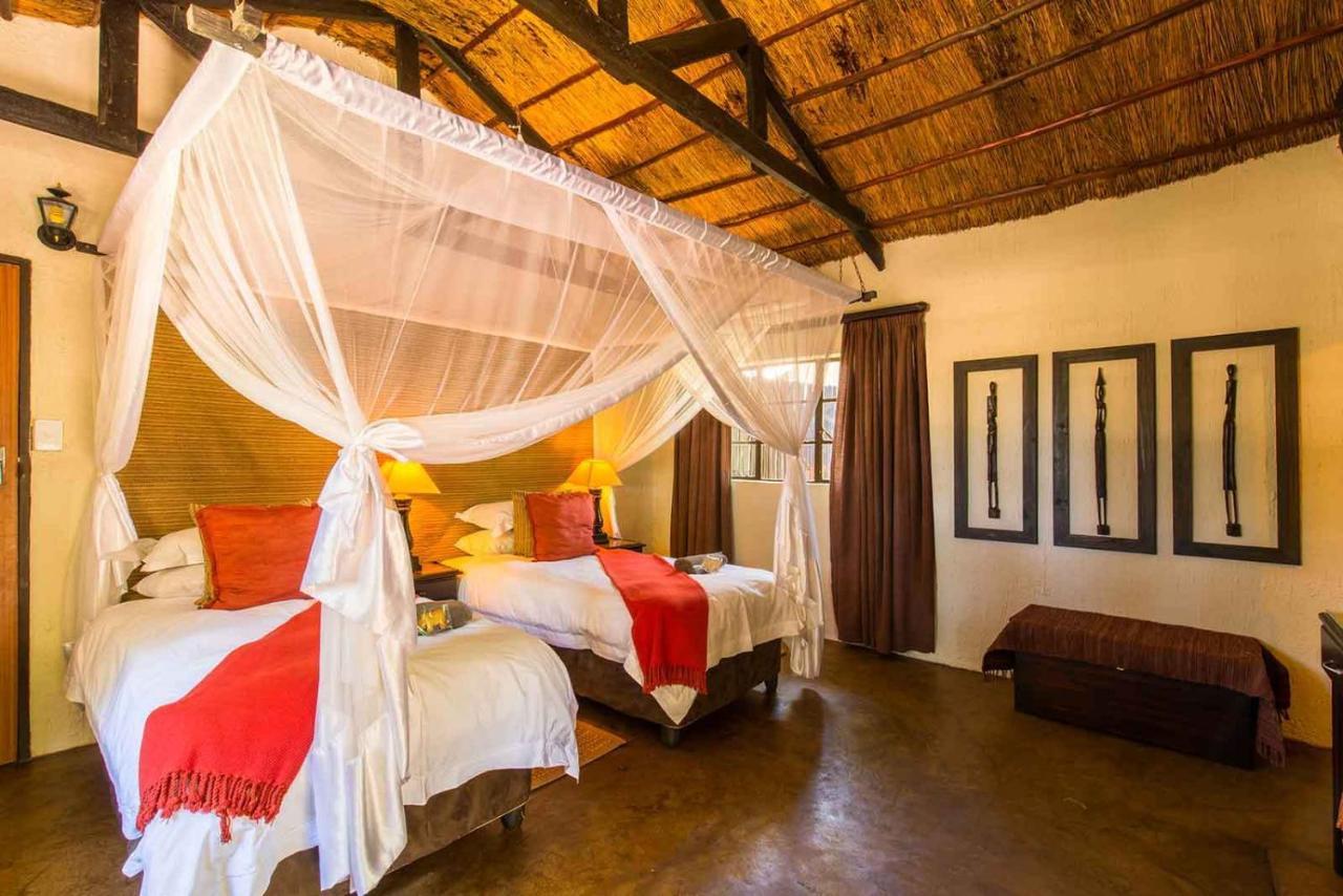 Umkumbe Safari Lodge Riverside Скукуза Экстерьер фото