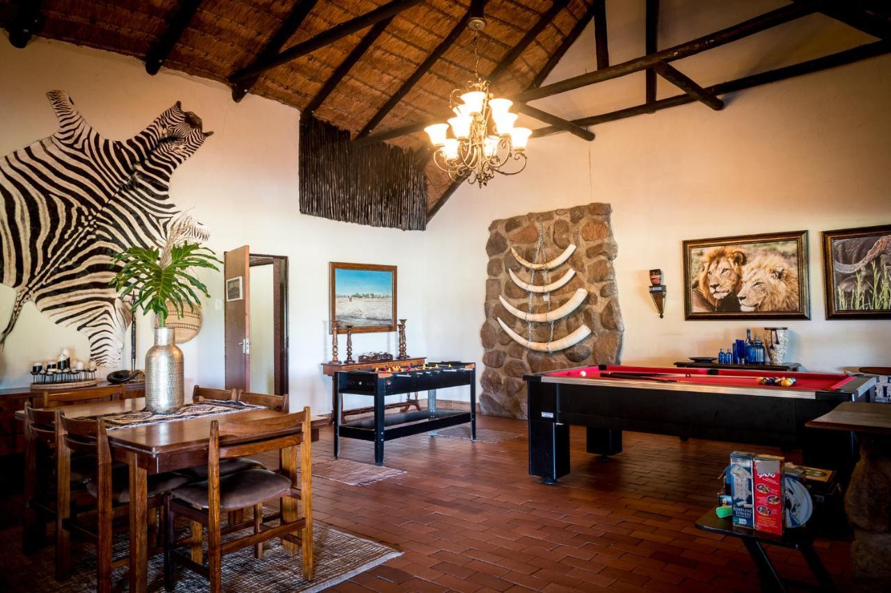 Umkumbe Safari Lodge Riverside Скукуза Экстерьер фото